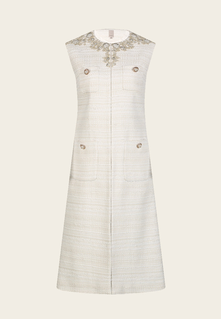 cream chanel tweed dress CHANEL Fall-Winter 2025/26 Haute Couture collection Twin silhouettes of understated richness. These tweed dresses feature a false plain weave in soft beige and cream tones. A deeply textured tweed composed of looped,