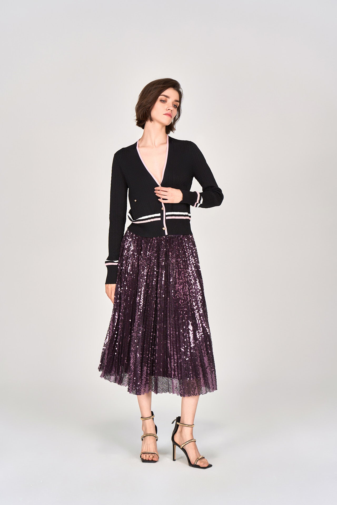 Deep red pleated shop skirt with sequin embellishments