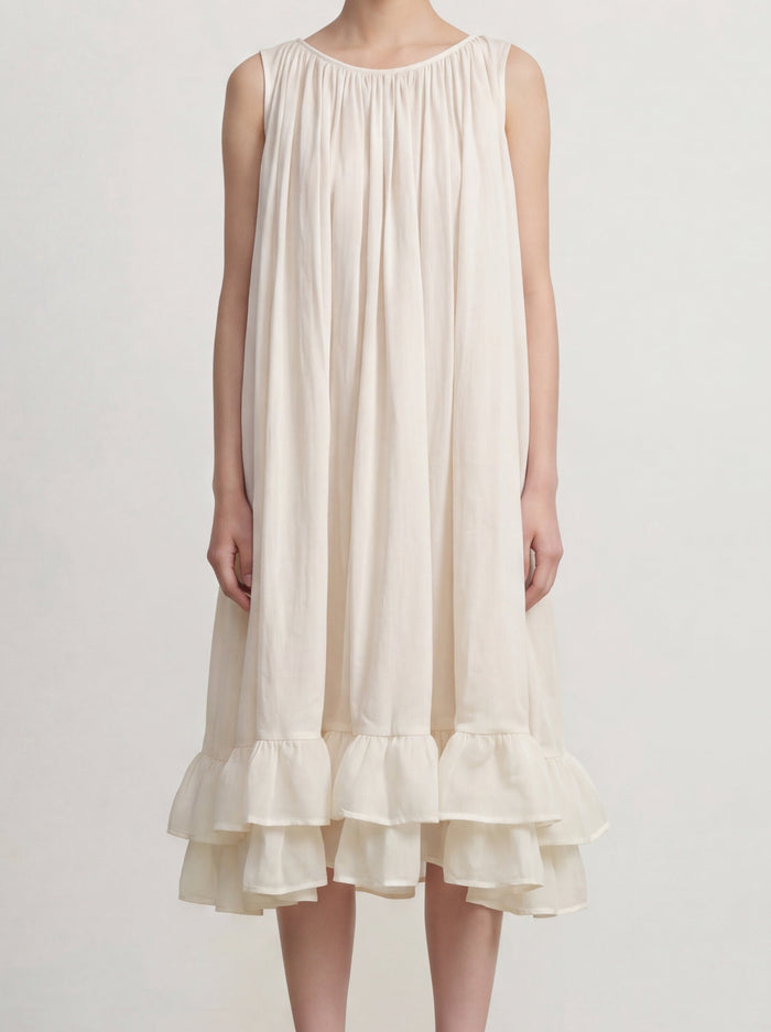 Crème Cascade Ruffle Dress